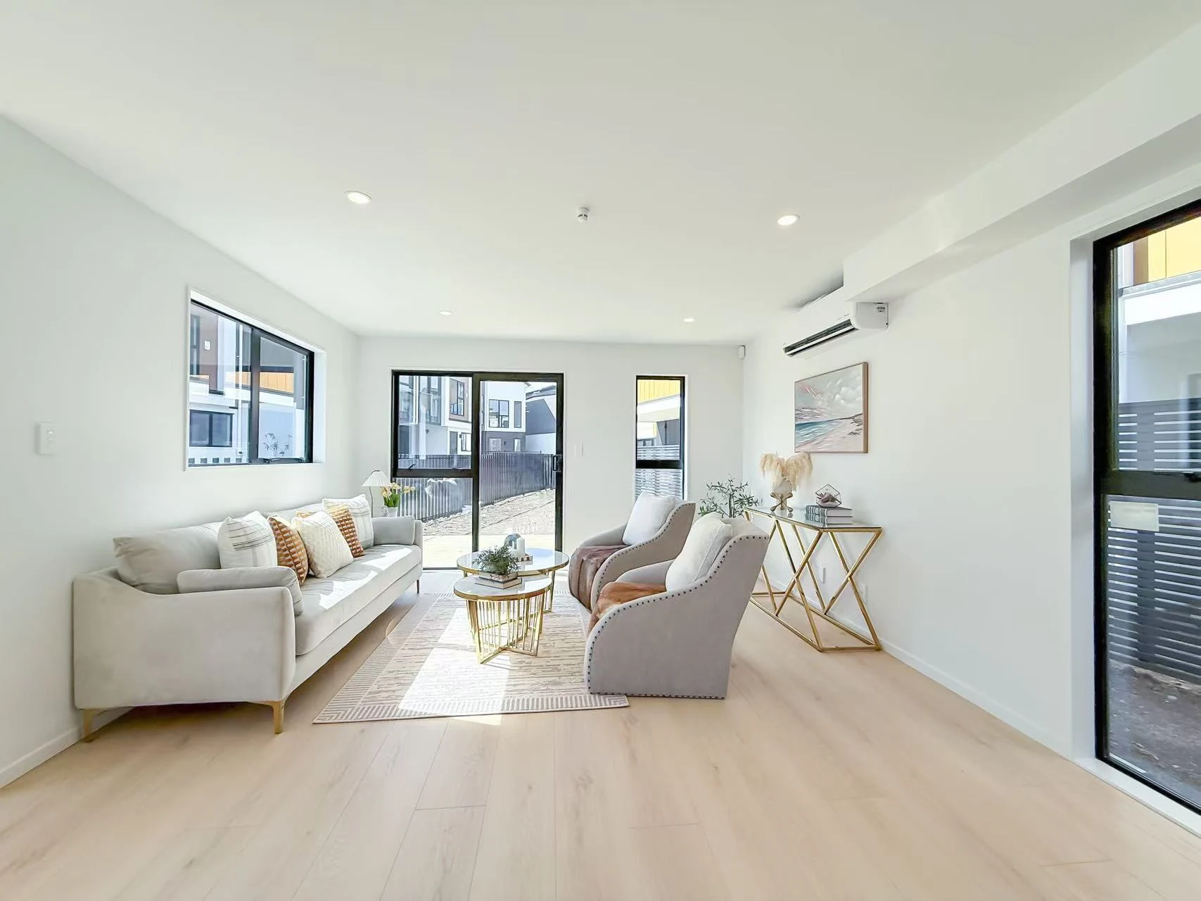 Furnished living room with glazing and light timber-look flooring